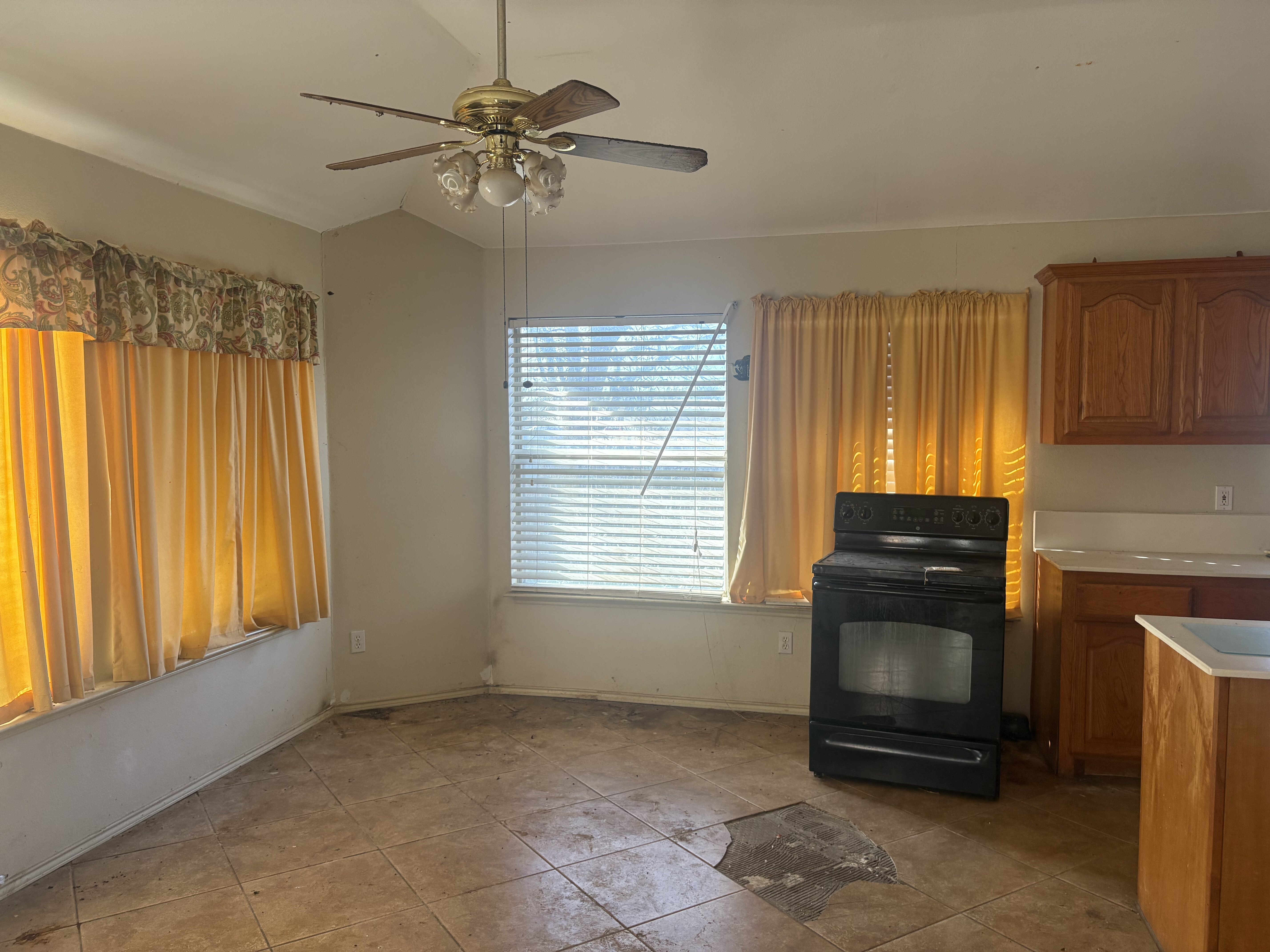 Kitchen area with tile flooring